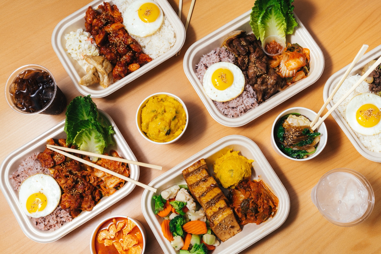 Soban Korean meals, rice, side dishes and drinks arranged on a table